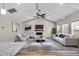 Open living room with vaulted ceiling and kitchen view at 257 Macallan Dr, Burlington, NC 27215