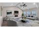 Bright living room with vaulted ceiling, fireplace, and comfy seating at 257 Macallan Dr, Burlington, NC 27215