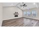 Spacious living room with hardwood floors, fireplace, and vaulted ceiling at 257 Macallan Dr, Burlington, NC 27215