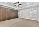 Large main bedroom with walk-in closet and ceiling fan at 257 Macallan Dr, Burlington, NC 27215