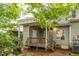 Home features a back porch with wooden deck and steps leading to the yard at 2635 Broad Oaks Pl, Raleigh, NC 27603