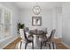 Virtually staged dining room, featuring a table and chairs at 2635 Broad Oaks Pl, Raleigh, NC 27603