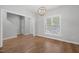 Dining room with hardwood floors and chandelier at 2635 Broad Oaks Pl, Raleigh, NC 27603