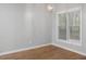 Bright dining room with hardwood floors and large window at 2635 Broad Oaks Pl, Raleigh, NC 27603