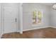 Bright entryway with hardwood floors and white door at 2635 Broad Oaks Pl, Raleigh, NC 27603