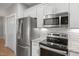 Stainless steel appliances in a modern kitchen at 2635 Broad Oaks Pl, Raleigh, NC 27603