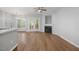 Living room with hardwood floors, fireplace and access to a deck at 2635 Broad Oaks Pl, Raleigh, NC 27603