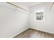 Walk-in closet with wood floors and window at 2730 Erinridge Rd, Raleigh, NC 27610