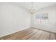 Bright dining room with geometric wall detail and chandelier at 2730 Erinridge Rd, Raleigh, NC 27610