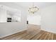 Dining area with chandelier and kitchen pass-through at 2730 Erinridge Rd, Raleigh, NC 27610
