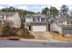 Two-story house with stone accents and a garage at 2730 Erinridge Rd, Raleigh, NC 27610
