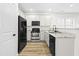 Modern kitchen with stainless steel appliances and granite countertops at 2730 Erinridge Rd, Raleigh, NC 27610