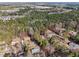 Aerial view of a residential neighborhood showing homes nestled among trees at 501 Pearson Dr, Durham, NC 27713