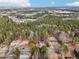 This aerial shot reveals the homes location amidst a well-wooded neighborhood at 501 Pearson Dr, Durham, NC 27713