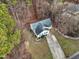 Aerial view of a quaint home with lush landscaping and a well-manicured lawn at 501 Pearson Dr, Durham, NC 27713