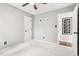 Bright bedroom with ceiling fan and adjacent wall art at 501 Pearson Dr, Durham, NC 27713