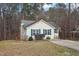 View of the home and yard on a quiet street at 501 Pearson Dr, Durham, NC 27713