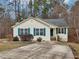 Charming one-story house with a green door and landscaped yard at 501 Pearson Dr, Durham, NC 27713