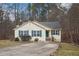 Charming home exterior with a well-kept lawn and inviting entrance at 501 Pearson Dr, Durham, NC 27713