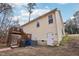 Back exterior of home with small deck and walkout basement entry at 501 Pearson Dr, Durham, NC 27713