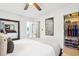 Bright bedroom featuring a walk-in closet and ensuite bathroom at 501 Pearson Dr, Durham, NC 27713