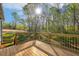 Backyard deck with sun and views of the trees at 5394 Salem Woods Dr # 16, Graham, NC 27253