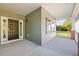 Inviting front porch features a door with glass panels and white railings at 5394 Salem Woods Dr # 16, Graham, NC 27253