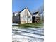 Gray house exterior with a large backyard at 55 Running Deer Path, Timberlake, NC 27583