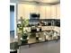 Modern kitchen features stainless steel appliances and a large island at 55 Running Deer Path, Timberlake, NC 27583