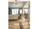 Open concept living room and kitchen with high ceilings, and hardwood floors at 55 Running Deer Path, Timberlake, NC 27583