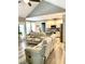Open concept living room with a view into the kitchen and access to the outside at 55 Running Deer Path, Timberlake, NC 27583