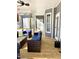 Relaxing screened porch with seating and wood flooring at 55 Running Deer Path, Timberlake, NC 27583