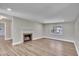 Spacious living room with fireplace and wood floor at 701 Wilsons Mills Rd, Smithfield, NC 27577