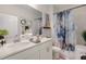 Modern bathroom with double vanity and a walk-in shower at 8101 Fergus Ct, Wake Forest, NC 27587