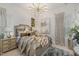 Spacious bedroom with a comfortable bed and stylish decor at 8101 Fergus Ct, Wake Forest, NC 27587