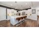 Spacious kitchen with white cabinets, quartz countertops, and stainless steel appliances at 8101 Fergus Ct, Wake Forest, NC 27587