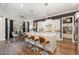 Modern kitchen features white cabinets, a large island, and stainless steel appliances at 8101 Fergus Ct, Wake Forest, NC 27587