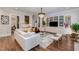 Spacious living room with built-in shelving and large windows at 8101 Fergus Ct, Wake Forest, NC 27587