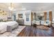 Luxurious main bedroom featuring a bay window and sitting area at 8101 Fergus Ct, Wake Forest, NC 27587
