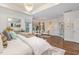 Bright and airy main bedroom with sitting area and ensuite bathroom at 8101 Fergus Ct, Wake Forest, NC 27587