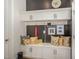 Mudroom with built-in bench seating and storage cabinets at 8101 Fergus Ct, Wake Forest, NC 27587