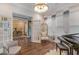 Bright music room with hardwood floors and French doors at 8101 Fergus Ct, Wake Forest, NC 27587