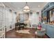 Music room featuring a grand piano and stylish seating at 8101 Fergus Ct, Wake Forest, NC 27587