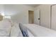 Bright bedroom with a double bed and neutral-toned bedding at 830 E Lenoir St, Raleigh, NC 27601