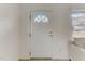 White door with a window and a view of a living room at 830 E Lenoir St, Raleigh, NC 27601