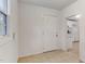 Small laundry area with a white door and a view of the kitchen at 830 E Lenoir St, Raleigh, NC 27601