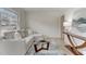 Cozy living room with a sectional sofa and a modern coffee table at 830 E Lenoir St, Raleigh, NC 27601