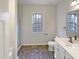 Clean bathroom with single vanity and shower at 1004 Cabin Hill Way, Garner, NC 27529