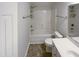 Clean bathroom with shower/tub combo and tile flooring at 1004 Cabin Hill Way, Garner, NC 27529