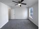 Bright bedroom with window and plush carpeting at 1004 Cabin Hill Way, Garner, NC 27529
